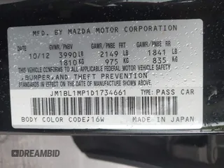 2013 Mazda 3 i Grand Touring with VIN JM1BL1MP1D1734661, listed as a IAAI auction lot 41725032 with 98,536 mi miles and . Bid and sale history available at DreamBid. Image 9.