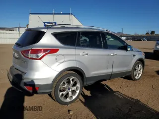 2014 Ford Escape Titanium with VIN 1FMCU9J9XEUB10861, listed as a Copart auction lot 50766115 with 134,469 mi miles and Salvage Title. Bid and sale history available at DreamBid. Image 3.