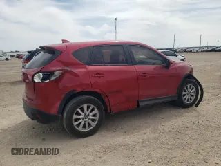 2016 Mazda CX-5 Sport with VIN JM3KE2BY8G0874641, listed as a Copart auction lot 51167845 with 104,571 mi miles and Clean Title. Bid and sale history available at carsss.com. Image 3.
