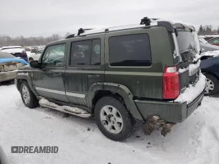 2007 Jeep Commander Overland with VIN 1J8HG68247C555994, listed as a Copart auction lot 86903914 with 219,294 mi miles and Salvage title. Bid and sale history available at DreamBid. Image 2.