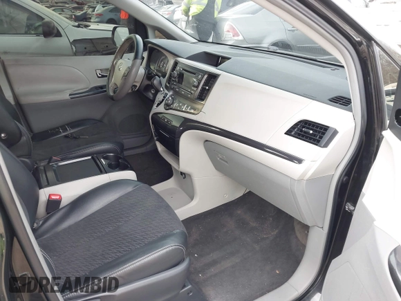 2011 Toyota Sienna SE with VIN 5TDXK3DCXBS112867, listed as a IAAI auction lot 41394925 with 235,567 mi miles. Bid and sale history available at carsss.com. Image 5.