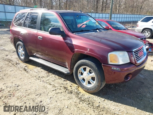 2007 GMC Envoy SLE with VIN 1GKDS13S472201367, listed as a IAAI auction lot 41327646 with 232,019 mi miles. Bid and sale history available at carsss.com. Image 1.