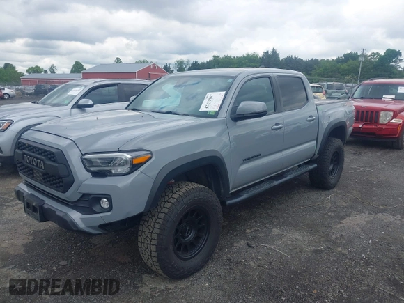 2021 Toyota Tacoma SR with VIN 5TFCZ5AN3MX258746, listed as a IAAI auction lot 42252967 with 62,095 mi miles and . Bid and sale history available at DreamBid. Image 17.