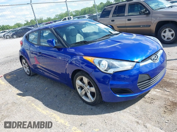 2012 Hyundai Veloster w/Gray Int z VIN KMHTC6AD3CU074501, wystawiony jako IAAI lot #42289456 z przebiegiem 94 303 mil mil oraz . Historia ofert i sprzedaży dostępna na DreamBid. Obrazek 1.