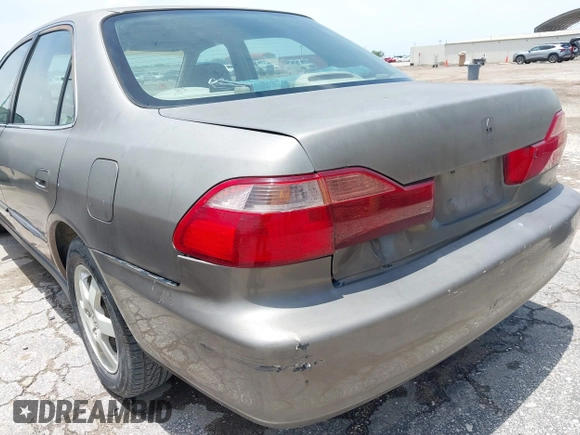 2000 Honda Accord SE z VIN 1HGCG5673YA090469, wystawiony jako IAAI lot #42391254 z przebiegiem 140 819 mil mil oraz . Historia ofert i sprzedaży dostępna na DreamBid. Obrazek 6.