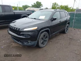 2016 Jeep Cherokee Latitude with VIN 1C4PJMCBXGW112540, listed as a IAAI auction lot 42336449 with 94,774 mi miles and . Bid and sale history available at DreamBid. Image 2.