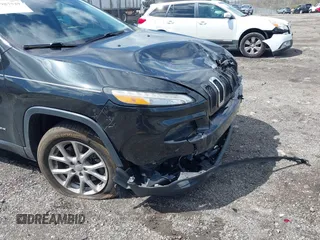 2014 Jeep Cherokee Latitude with VIN 1C4PJMCS8EW257959, listed as a IAAI auction lot 41987529 with 124,749 mi miles. Bid and sale history available at carsss.com. Image 19.