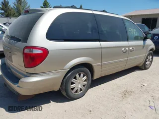 2005 Chrysler Town & Country Touring z VIN 2C4GP54L45R123762, wystawiony jako IAAI lot #42235745 z przebiegiem 217 713 mil mil oraz . Historia ofert i sprzedaży dostępna na DreamBid. Obrazek 4.
