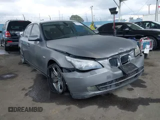 2010 BMW 5 Series 528i with VIN WBANU5C56AC127797, listed as a IAAI auction lot 42128290 with 137,578 mi miles and . Bid and sale history available at carsss.com. Image 1.