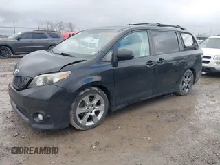 2012 Toyota Sienna SE with VIN 5TDXK3DC4CS187677, listed as a IAAI auction lot 41553292 with 145,282 mi miles. Bid and sale history available at carsss.com. Image 2.