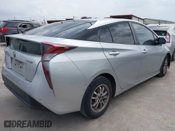 2016 Toyota Prius Four z VIN JTDKARFU5G3008768, wystawiony jako IAAI lot #42125504 z przebiegiem 164 229 mil mil oraz . Historia ofert i sprzedaży dostępna na DreamBid. Obrazek 4.
