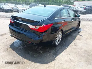 2013 Hyundai Sonata Limited with VIN 5NPEC4AC0DH764842, listed as a IAAI auction lot 42160807 with 154,148 mi miles and . Bid and sale history available at DreamBid. Image 4.