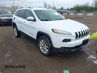 2014 Jeep Cherokee Limited with VIN 1C4PJMDB2EW281396, listed as a IAAI auction lot 42075036 with 113,578 mi miles. Bid and sale history available at carsss.com. Image 1.
