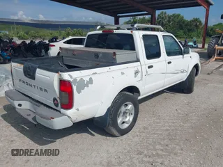 2001 Nissan Frontier SE z VIN 1N6ED27T61C324671, wystawiony jako IAAI lot #42403537 z przebiegiem 190 638 mil mil oraz . Historia ofert i sprzedaży dostępna na DreamBid. Obrazek 4.