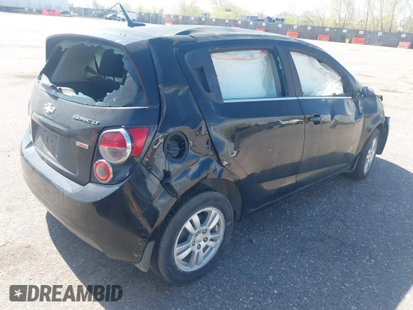 2012 Chevrolet Sonic LT with VIN 1G1JC6SB9C4200197, listed as a IAAI auction lot 42085421 with 124,667 mi miles. Bid and sale history available at carsss.com. Image 4.