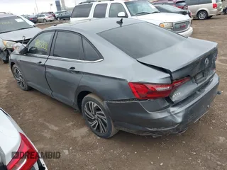 2021 Volkswagen Jetta SEL z VIN 3VWE57BU5MM086681, wystawiony jako IAAI lot #41832830 z przebiegiem 37 398 mil mil oraz . Historia ofert i sprzedaży dostępna na DreamBid. Obrazek 3.