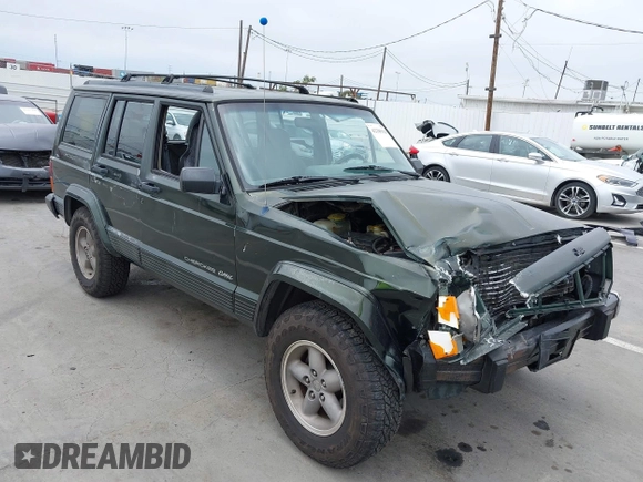 1996 Jeep Cherokee Sport z VIN 1J4FT68S6TL267408, wystawiony jako IAAI lot #42385629 z przebiegiem 268 753 mil mil oraz . Historia ofert i sprzedaży dostępna na DreamBid. Obrazek 1.