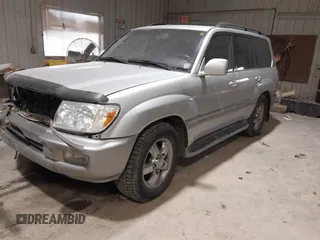 2007 Toyota Land Cruiser z VIN JTEHT05J972108283, wystawiony jako IAAI lot #41476536 z przebiegiem 212 693 mil mil oraz . Historia ofert i sprzedaży dostępna na DreamBid. Obrazek 2.