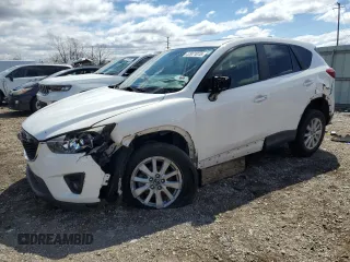 2015 Mazda CX-5 Touring with VIN JM3KE2CY2F0541400, listed as a Copart auction lot 52971015 with 131,569 mi miles and Clean Title. Bid and sale history available at carsss.com. Image 1.