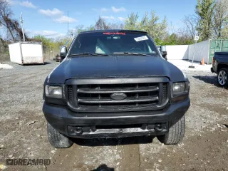 1999 Ford Super Duty F-250 XL with VIN 1FTNX21L5XEA67499, listed as a Copart auction lot 50822095 with 480,067 mi miles and Salvage Title. Bid and sale history available at carsss.com. Image 5.