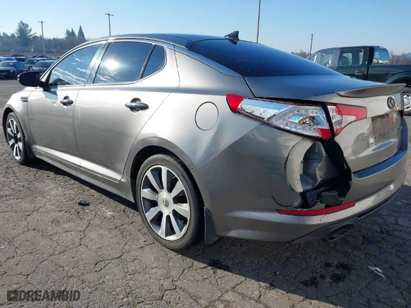 2013 Kia Optima SX w/Limited Pkg with VIN 5XXGR4A69DG190125, listed as a IAAI auction lot 41424498 with 134,056 mi miles. Bid and sale history available at carsss.com. Image 3.