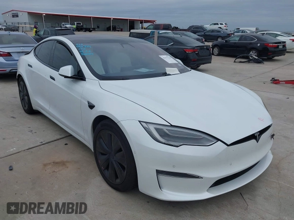 2021 Tesla Model S Plaid z VIN 5YJSA1E64MF452744, wystawiony jako IAAI lot #41375136 z przebiegiem Nie podano mil oraz . Historia ofert i sprzedaży dostępna na DreamBid. Obrazek 1.