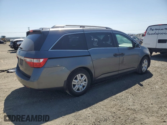 2012 Honda Odyssey LX with VIN 5FNRL5H28CB019953, listed as a Copart auction lot 54586855 with 151,460 mi miles and Salvage Title. Bid and sale history available at carsss.com. Image 3.