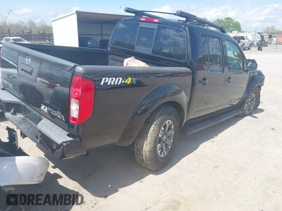 2014 Nissan Frontier SV with VIN 1N6AD0EV0EN758585, listed as a IAAI auction lot 41943169 with 186,214 mi miles and . Bid and sale history available at DreamBid. Image 4.