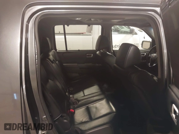 2012 Honda Pilot Touring with VIN 5FNYF4H98CB030879, listed as a IAAI auction lot 41619003 with 201,131 mi miles. Bid and sale history available at carsss.com. Image 8.