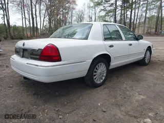 2010 Mercury Grand Marquis LS with VIN 2MEBM7FV9AX603975, listed as a IAAI auction lot 41962323 with 178,178 mi miles. Bid and sale history available at carsss.com. Image 4.