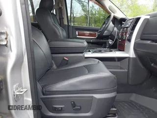 2010 Dodge 1500 SLT z VIN 1D7RB1CT5AS203992, wystawiony jako IAAI lot #41931671 z przebiegiem 122 831 mil mil oraz . Historia ofert i sprzedaży dostępna na DreamBid. Obrazek 5.