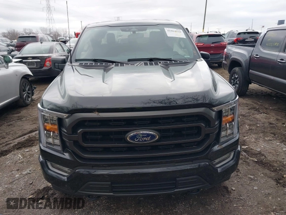 2023 Ford F-150 XL with VIN 1FTFW1E59PFA89187, listed as a IAAI auction lot 41064918 with 62,858 mi miles. Bid and sale history available at carsss.com. Image 12.