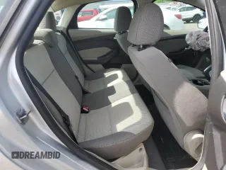 2013 Ford Focus SE z VIN 1FADP3F24DL193495, wystawiony jako Copart lot #57796005 z przebiegiem 178 621 mil mil oraz Tytuł czysty. Historia ofert i sprzedaży dostępna na DreamBid. Obrazek 10.