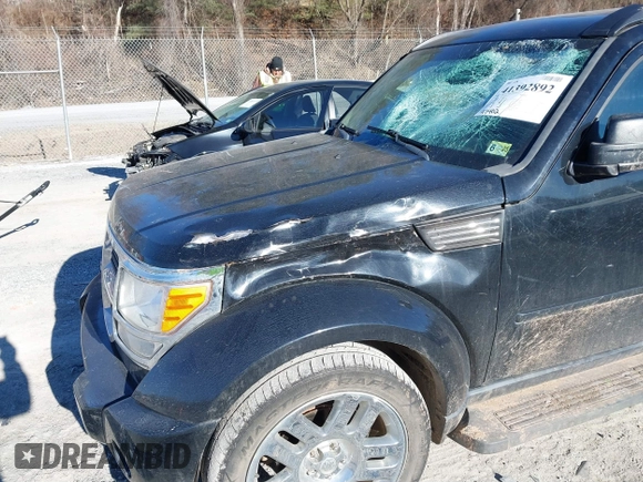 2007 Dodge Nitro SLT with VIN 1D8GU58K67W688374, listed as a IAAI auction lot 41392892 with 97,402 mi miles. Bid and sale history available at carsss.com. Image 6.