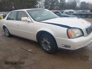 2002 Cadillac DeVille DHS z VIN 1G6KE57YX2U212020, wystawiony jako IAAI lot #41287342 z przebiegiem Nie podano mil oraz . Historia ofert i sprzedaży dostępna na DreamBid. Obrazek 1.