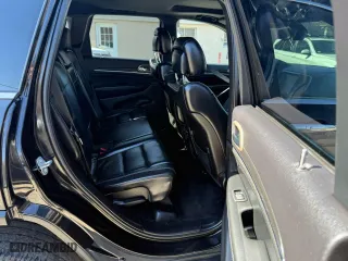 2015 Jeep Grand Cherokee Limited with VIN 1C4RJFBM4FC806566, listed as a Copart auction lot 49542775 with 143,770 mi miles and Clean Title. Bid and sale history available at carsss.com. Image 6.