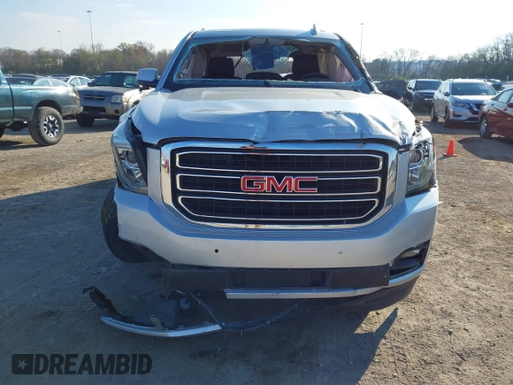 2020 GMC Yukon SLT Standard Edition with VIN 1GKS2DKCXLR294027, listed as a IAAI auction lot 41004965 with 69,161 mi miles. Bid and sale history available at carsss.com. Image 12.