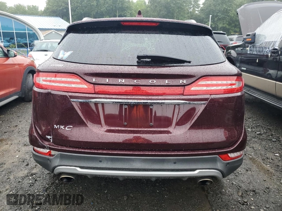 2019 Lincoln MKC Select with VIN 5LMCJ2D94KUL51819, listed as a Copart auction lot 66300324 with 69,619 mi miles and Salvage Title. Bid and sale history available at carsss.com. Image 6.