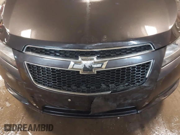 2014 Chevrolet Cruze 1LT with VIN 1G1PC5SBXE7477219, listed as a IAAI auction lot 41970786 with 194,542 mi miles and . Bid and sale history available at DreamBid. Image 6.