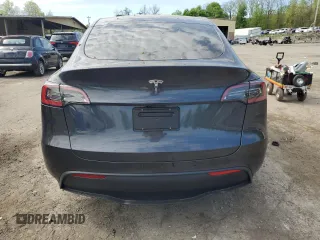 2025 Tesla Model Y Long Range with VIN 7SAYGDED7SF320702, listed as a Copart auction lot 54655325 with 1,169 mi miles and Salvage Title. Bid and sale history available at DreamBid. Image 6.