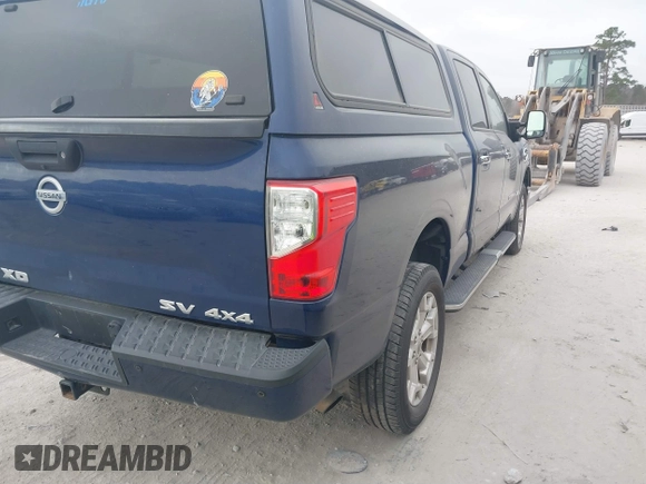 2019 Nissan Titan XD SV with VIN 1N6BA1F49KN506712, listed as a IAAI auction lot 41661789 with 107,972 mi miles. Bid and sale history available at carsss.com. Image 4.