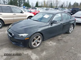 2013 BMW 3 Series 328i with VIN WBA3C1C53DF442532, listed as a IAAI auction lot 41945247 with 92,065 mi miles. Bid and sale history available at carsss.com. Image 2.