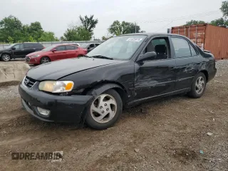 2001 Toyota Corolla CE with VIN 2T1BR12E31C454263, listed as a Copart auction lot 61025975 with 199,160 mi miles and Salvage title. Bid and sale history available at DreamBid. Image 1.