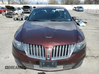 2012 Lincoln MKS EcoBoost with VIN 1LNHL9FT0CG800031, listed as a Copart auction lot 50520885 with 101,080 mi miles and Salvage title. Bid and sale history available at DreamBid. Image 5.