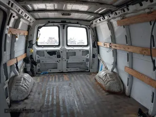 2011 Chevrolet Express Cargo Van with VIN 1GCWGFFA7B1108976, listed as a IAAI auction lot 40937070 with 296,821 mi miles. Bid and sale history available at carsss.com. Image 8.