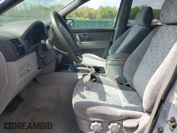 2006 Kia Sorento LX with VIN KNDJD733365591766, listed as a Copart auction lot 49040625 with 141,945 mi miles and Salvage Title. Bid and sale history available at DreamBid. Image 7.