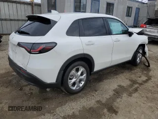 2023 Honda HR-V LX with VIN 3CZRZ1H37PM735335, listed as a Copart auction lot 58957705 with 21,203 mi miles and Salvage title. Bid and sale history available at DreamBid. Image 3.