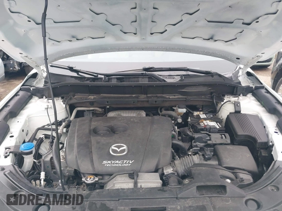 2017 Mazda CX-5 Touring z VIN JM3KFBCL5H0128584, wystawiony jako IAAI lot #42354669 z przebiegiem 56 563 mil mil oraz . Historia ofert i sprzedaży dostępna na DreamBid. Obrazek 10.