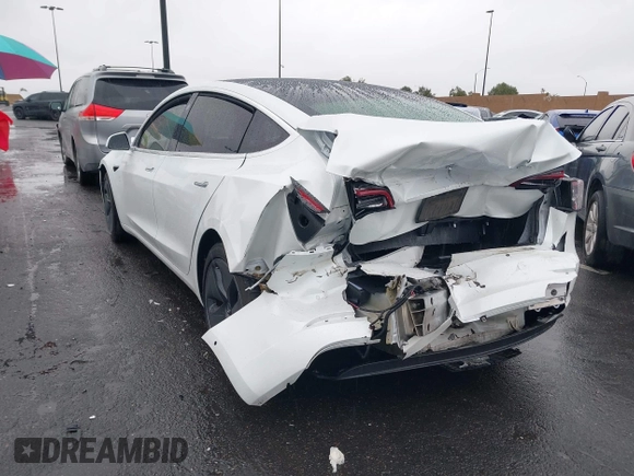 2020 Tesla Model 3 Standard Range Plus with VIN 5YJ3E1EA2LF740225, listed as a IAAI auction lot 41781554 with 46,703 mi miles. Bid and sale history available at carsss.com. Image 13.