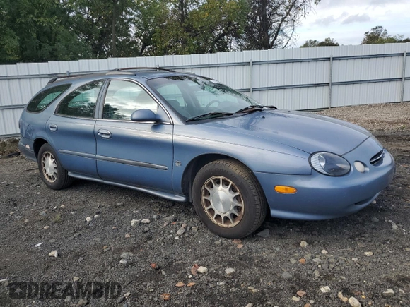 1999 Ford Taurus SE z VIN 1FAFP58S2XA261374, wystawiony jako Copart lot #74180494 z przebiegiem 193 416 mil mil oraz Szkody całkowita. Historia ofert i sprzedaży dostępna na DreamBid. Obrazek 4.